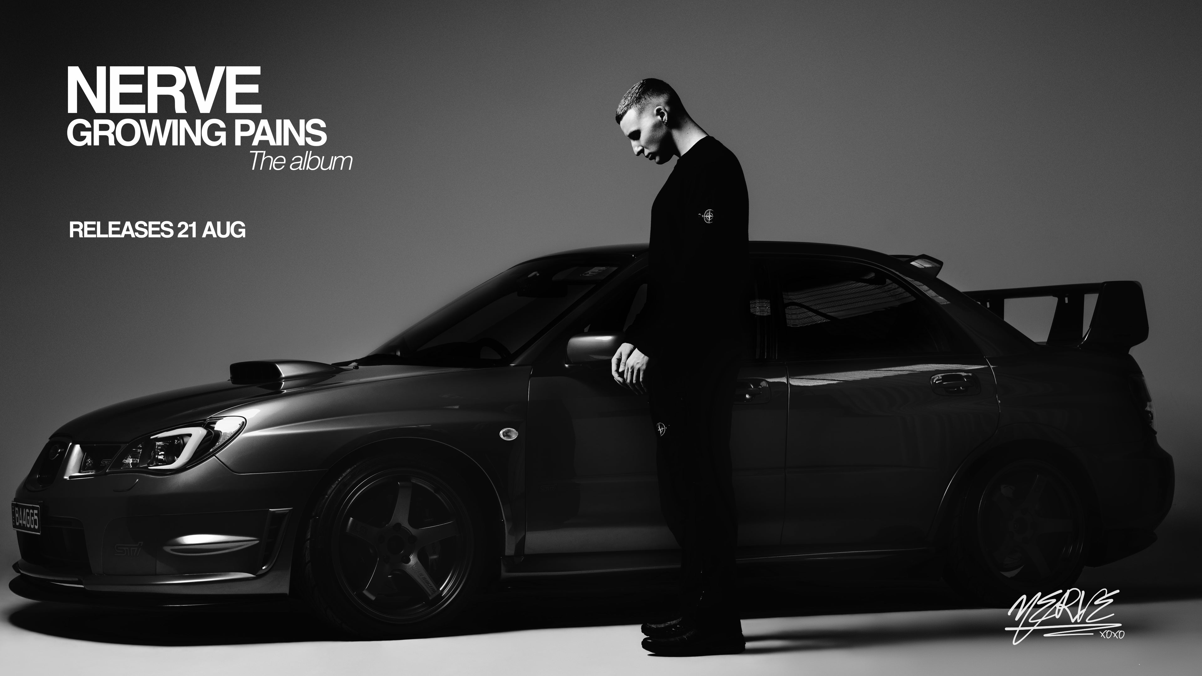 A dark gray promotional photo showing a man in a black suit standing beside a black sports car, with text reading 'NERVE GROWING PAINS The album' and 'RELEASES 21 AUG' on a dark studio background.